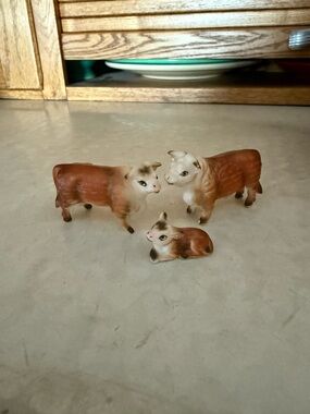 Brown and White Small Cattle Figurine Trio